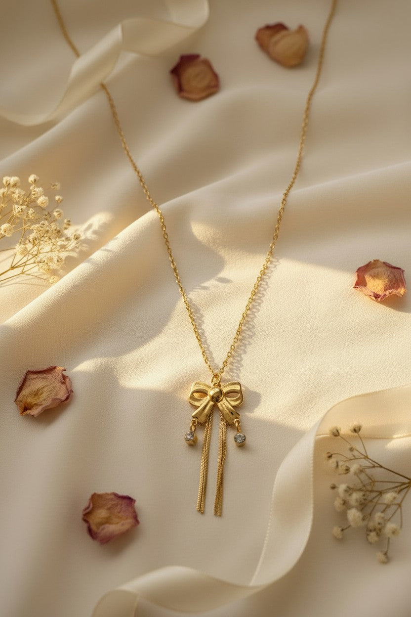 Golden Bow Tassel Pendant Necklace