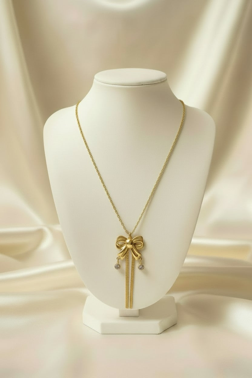 Golden Bow Tassel Pendant Necklace