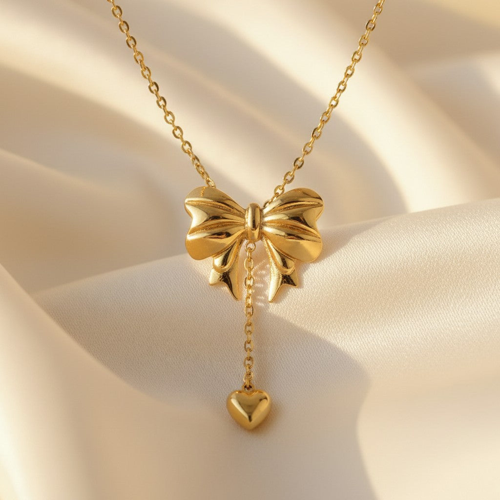 Gold Bow Heart Drop Pendant