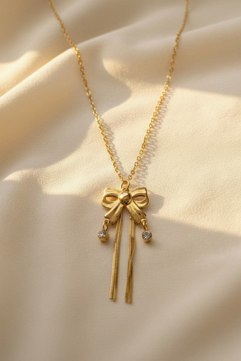 Golden Bow Tassel Pendant Necklace