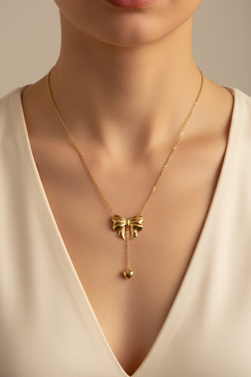 Gold Bow Heart Drop Pendant