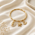 Coastal Charm Gold-Tone Bracelet